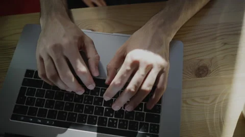 Freelancer programmer working from home on kitchen and using laptop. Bearded man Stock Footage 135732008