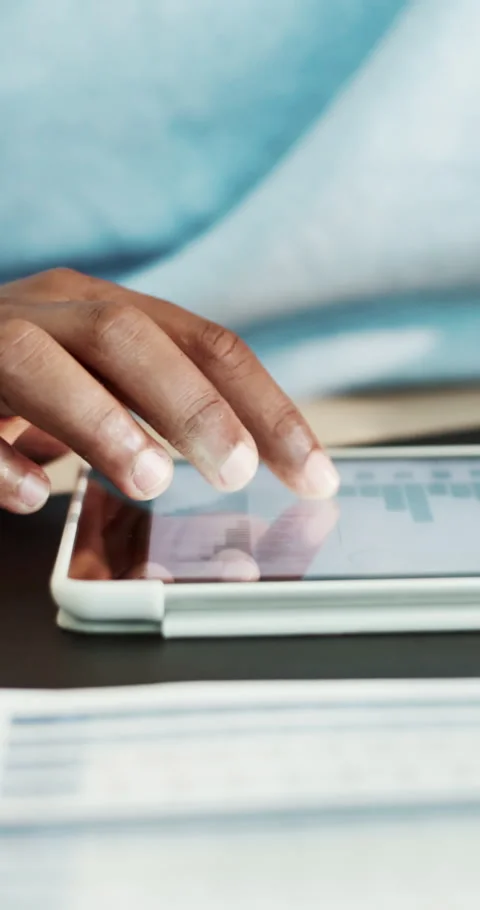 Freelancer, scroll and hands with tablet screen in home office, data analysis or Stock Footage 336838481