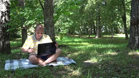 Freelancer self employed male using laptop. 4K Stock Footage 65224382