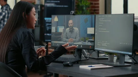 Freelancer software programer in video call conference with project owner Stock Footage 168246764