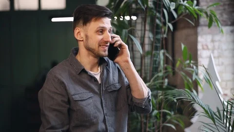 Freelancer Speaking on the Smartphone Видео 103744256