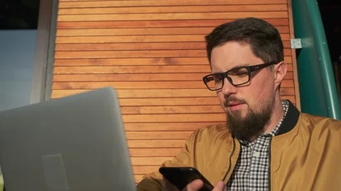 Freelancer talking on the phone. Stock Footage 105076682