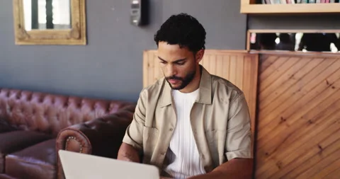 Freelancer, typing and man with laptop in cafe for remote work, reflection and Stock Footage 330062347