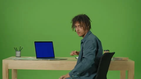 Freelancer Typing on Blue Screen Laptop Working in Internet, Doing Online Job Stock Footage 219757474