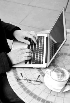 Freelancer typing on a computer Stock Photos