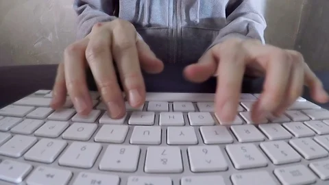 Freelancer typing on keyboard computer Stock Footage 94989803