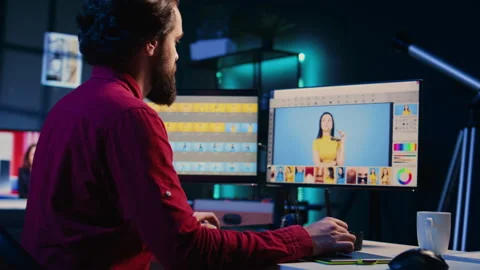 Freelancer using retouching program on graphic tablet , panning shot Video stock 257494271