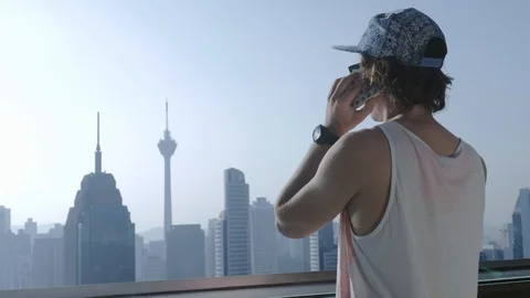 Freelancer using smartphone on modern city background. Stock Footage 106620661