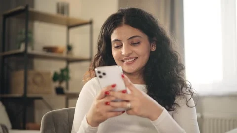 Freelancer woman have break using social media application on smartphone Stock Footage 251748160
