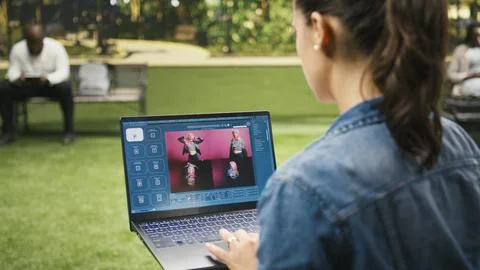 Freelancer woman using text to image AI tool for generating content Stock Photos