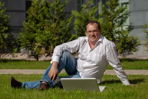 Freelancer at work with laptop Stock Photos