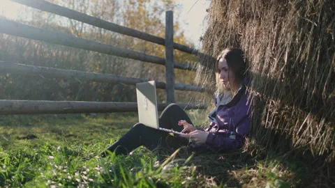 Freelancer work remotely in autumn countryside Stock Footage 246765994