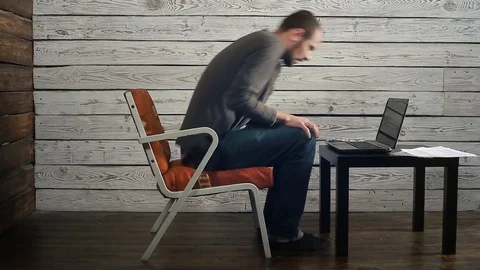 Freelancer working behind a computer with documents Stock Footage 83072887