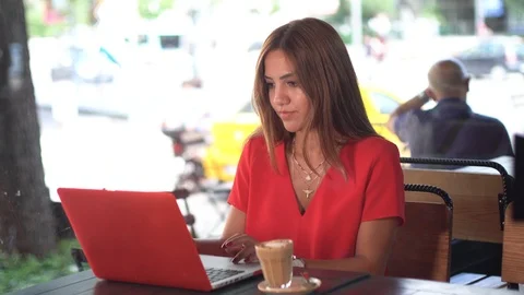 Freelancer working at a coffee shop Stock Footage 93836045