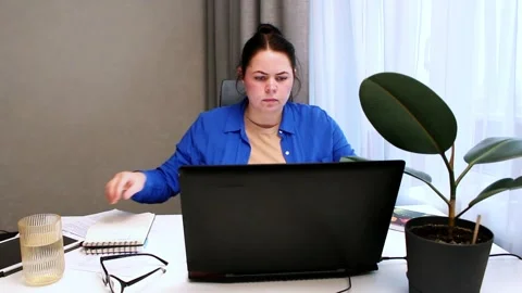 Freelancer working on digital project from home office. Flexible freelance Stock Footage 323082288