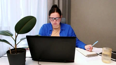 Freelancer working on digital project from home office. Flexible freelance Stock Footage 327010021