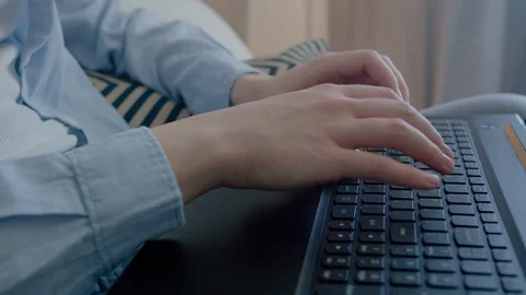 Freelancer working on freelance from home typing email on laptop focused girl Stock Footage 128823065
