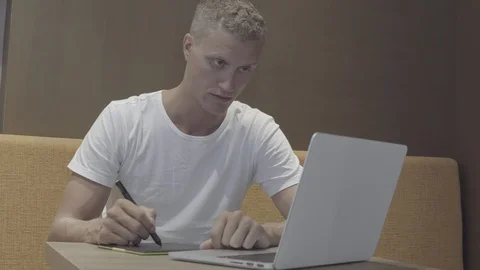Freelancer working with graphic tablet and laptop sketching new project Stock Footage 88593876