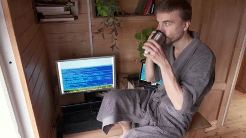Freelancer working home in quarantine, talking smartphone and coughs or sneezes Video stock 130494345