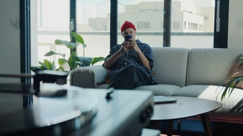 Freelancer working from home using smartphone Stock Footage 306582225