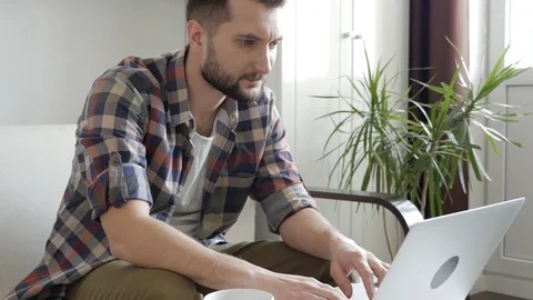 Freelancer working on the laptop at home Stock Footage 85346113
