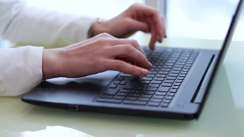 Freelancer working on laptop at home Stock Footage 169478924