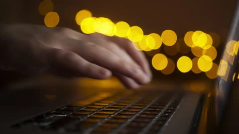 Freelancer working on laptop at home-office at night. Close up of hands. Person Video stock 147201552
