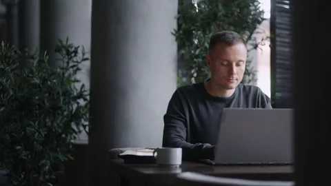 Freelancer Working With Laptop In Lunch Time In Cafe, Portrait Of Man With Stock Footage 248509260