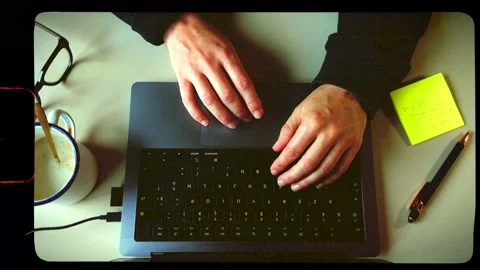 Freelancer, working on laptop, working from home, retro analog film frame Видео 324493077