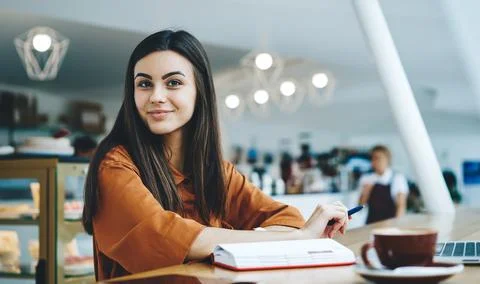 Freelancer working at project in cafeteria Stock Photos