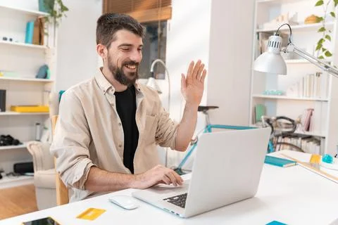 Freelancer working remotely from home. Millennial working on computer desk Stock Photos