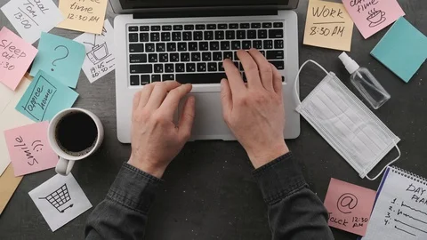 Freelancer works on a desktop computer, top view Stock Footage 129574967
