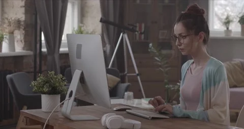 Freelancer works from home on a computer Stock Footage 154319291
