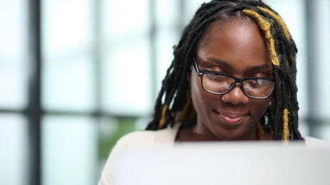 A freelancer works remotely on a laptop in a browser on a new project for work Stock Footage 237856238