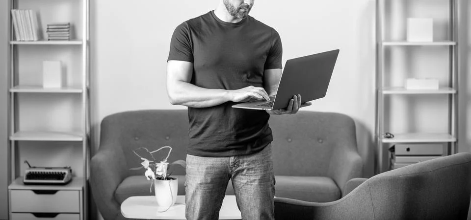 Freelancer writing online. guy using laptop for blogging. social network and 写真素材