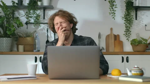 Freelancer yawn after productive work, man stretching his arms after work Stock Footage 146360668