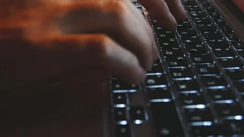 Freelancer young man prints on macbook. Close-up. Stock Footage 103613369