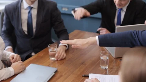 Freelancers join hands in a sign of teamwork, cheerfully and cheerfully applaud Stock Footage 130155829