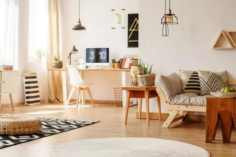 Freelancer's work zone with sofa Foto stock