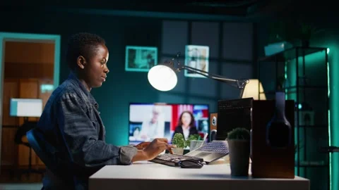 Freelancing admin in home office using laptop to write programming language code Stock Footage 319516984