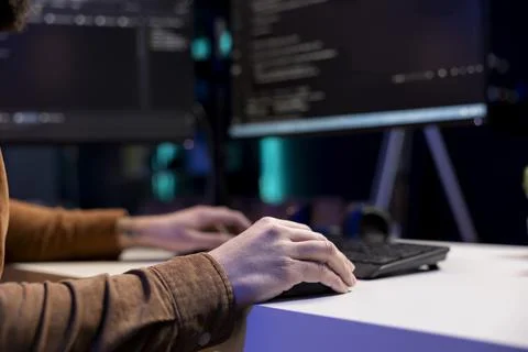 Freelancing cybersecurity admin using computer to prevent cyber attacks Stock Photos