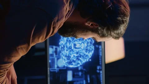 Freelancing IT specialist writing AI code, training machine learning Stock Footage 265107556