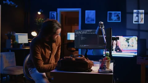 Freelancing IT system administrator arriving in personal office at home Stock Footage 265506815