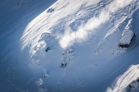 Freeride skier falling down slope Stock Photos