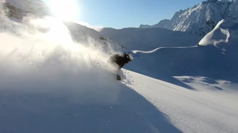 Freeride Skiing with lots of fresh deep snow in Tirol. Backcountry skiing Stock Footage