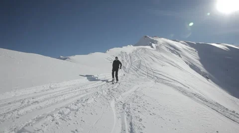 Freerider next to camera od ridge Stock Footage 46150575