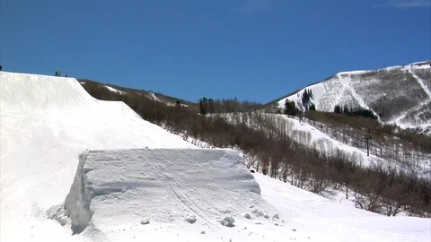 Freeskier performs aerial at slope style park, Park City, Utah. Video stock 106790795