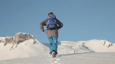 Freeskier running on summit Stock Footage 46152258