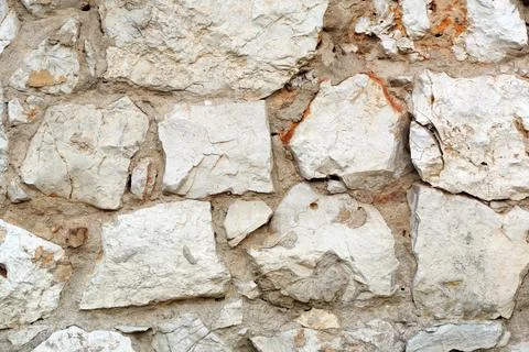 Freestone wall, background and texture Stock Photos