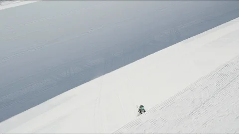 Freestyle skier jumping out of a halfpipe and performing a 360 close to camera Stock Footage 113205578
